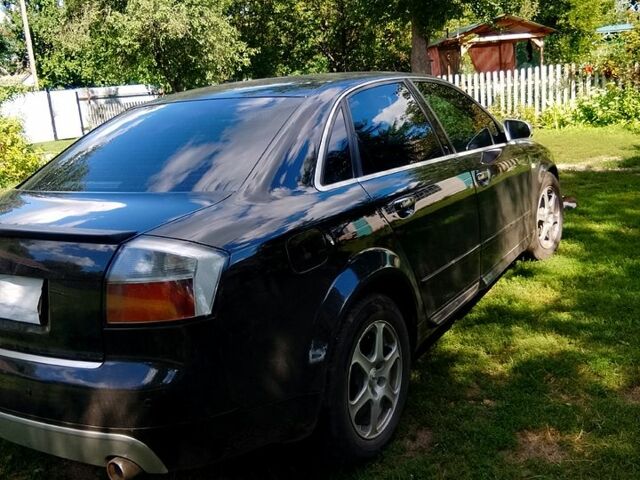 Чорний Ауді А4, об'ємом двигуна 1.8 л та пробігом 345 тис. км за 6000 $, фото 3 на Automoto.ua