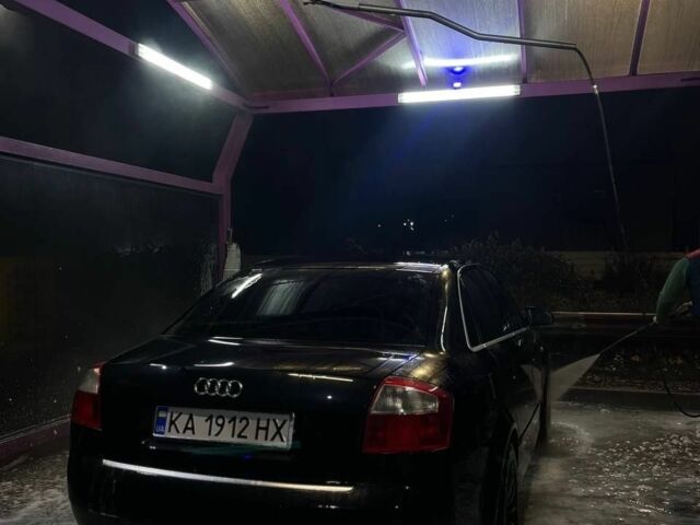 Черный Ауди А4, объемом двигателя 2.5 л и пробегом 365 тыс. км за 4900 $, фото 1 на Automoto.ua