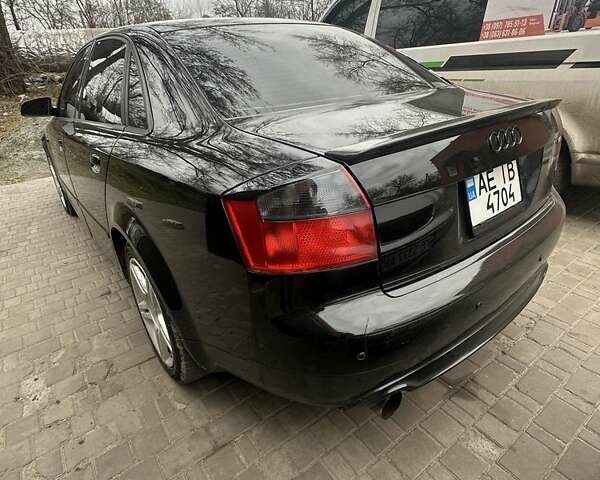 Черный Ауди А4, объемом двигателя 1.8 л и пробегом 295 тыс. км за 5600 $, фото 3 на Automoto.ua