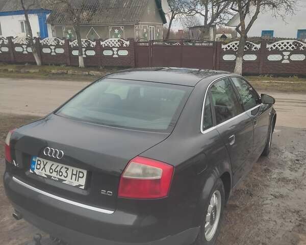 Черный Ауди А4, объемом двигателя 1.98 л и пробегом 235 тыс. км за 4649 $, фото 5 на Automoto.ua