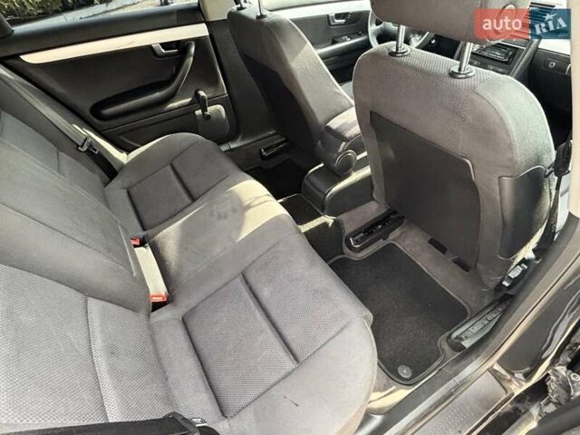 Черный Ауди А4, объемом двигателя 1.6 л и пробегом 214 тыс. км за 5500 $, фото 13 на Automoto.ua