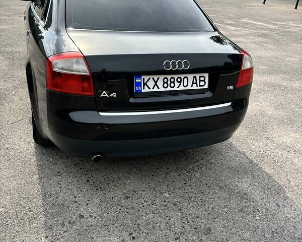 Черный Ауди А4, объемом двигателя 1.6 л и пробегом 214 тыс. км за 5500 $, фото 3 на Automoto.ua