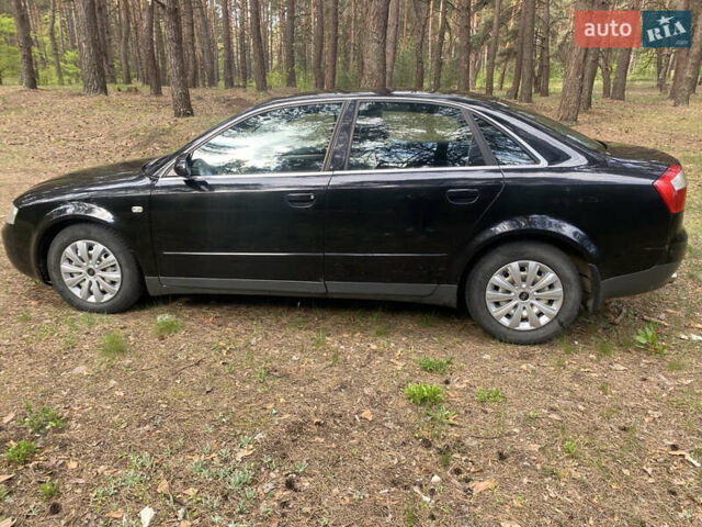 Черный Ауди А4, объемом двигателя 1.98 л и пробегом 266 тыс. км за 5000 $, фото 4 на Automoto.ua