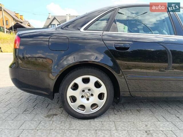 Черный Ауди А4, объемом двигателя 1.6 л и пробегом 325 тыс. км за 5999 $, фото 13 на Automoto.ua