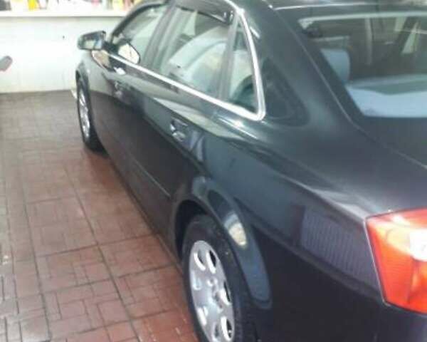 Черный Ауди А4, объемом двигателя 1.6 л и пробегом 213 тыс. км за 5000 $, фото 14 на Automoto.ua