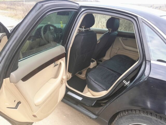 Черный Ауди А4, объемом двигателя 2 л и пробегом 220 тыс. км за 4200 $, фото 7 на Automoto.ua