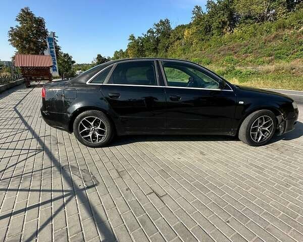 Чорний Ауді А4, об'ємом двигуна 2 л та пробігом 215 тис. км за 3650 $, фото 1 на Automoto.ua