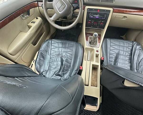 Черный Ауди А4, объемом двигателя 1.98 л и пробегом 300 тыс. км за 4500 $, фото 21 на Automoto.ua