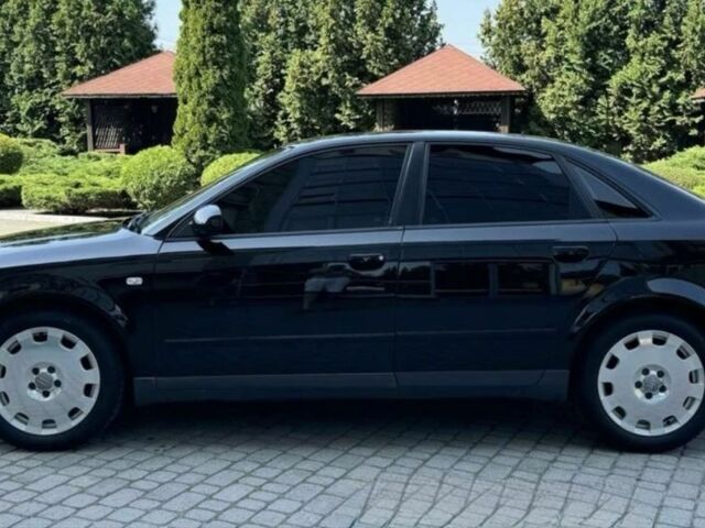 Черный Ауди А4, объемом двигателя 2 л и пробегом 217 тыс. км за 5200 $, фото 2 на Automoto.ua
