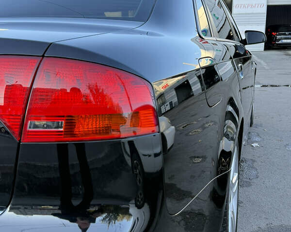 Черный Ауди А4, объемом двигателя 2 л и пробегом 173 тыс. км за 9000 $, фото 5 на Automoto.ua