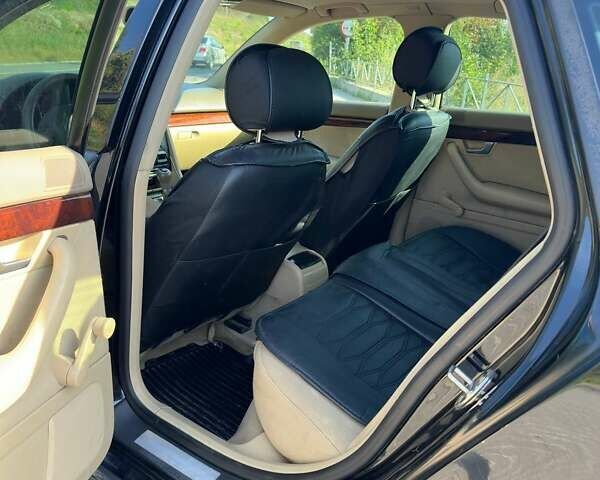 Чорний Ауді А4, об'ємом двигуна 2 л та пробігом 215 тис. км за 3650 $, фото 6 на Automoto.ua