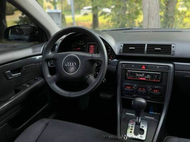 Черный Ауди А4, объемом двигателя 2 л и пробегом 217 тыс. км за 5200 $, фото 4 на Automoto.ua