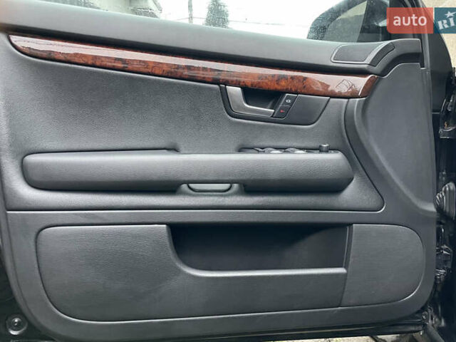 Черный Ауди А4, объемом двигателя 2.5 л и пробегом 300 тыс. км за 6000 $, фото 5 на Automoto.ua