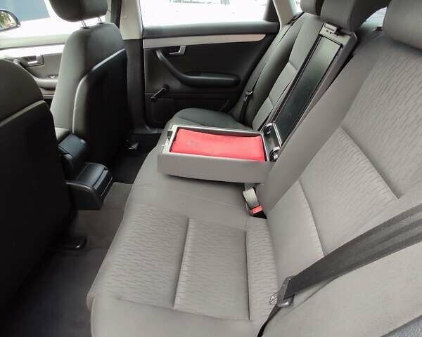 Черный Ауди А4, объемом двигателя 1.6 л и пробегом 245 тыс. км за 7650 $, фото 87 на Automoto.ua