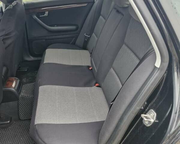 Чорний Ауді А4, об'ємом двигуна 1.78 л та пробігом 299 тис. км за 5900 $, фото 2 на Automoto.ua