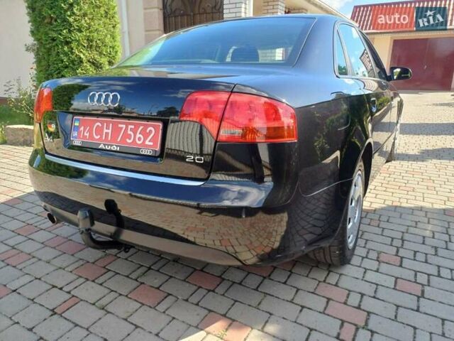 Черный Ауди А4, объемом двигателя 2 л и пробегом 208 тыс. км за 6900 $, фото 1 на Automoto.ua