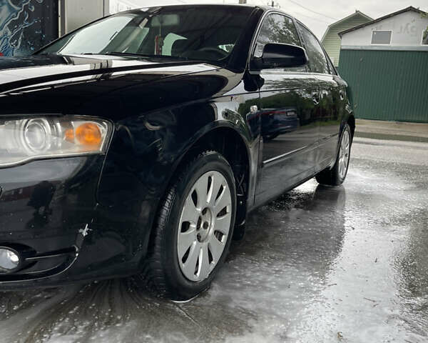 Черный Ауди А4, объемом двигателя 1.98 л и пробегом 283 тыс. км за 5200 $, фото 9 на Automoto.ua