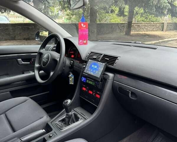 Черный Ауди А4, объемом двигателя 1.6 л и пробегом 198 тыс. км за 6100 $, фото 2 на Automoto.ua