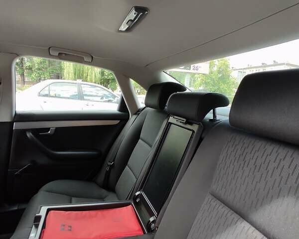 Черный Ауди А4, объемом двигателя 1.6 л и пробегом 245 тыс. км за 7650 $, фото 81 на Automoto.ua