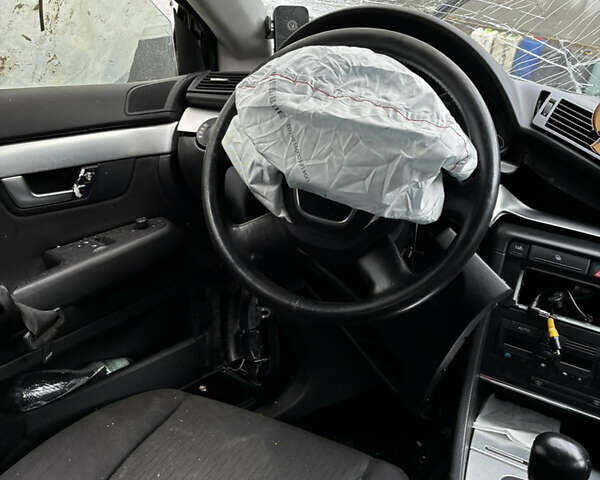 Чорний Ауді А4, об'ємом двигуна 2 л та пробігом 254 тис. км за 3000 $, фото 5 на Automoto.ua