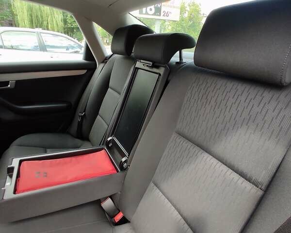 Черный Ауди А4, объемом двигателя 1.6 л и пробегом 245 тыс. км за 7650 $, фото 84 на Automoto.ua