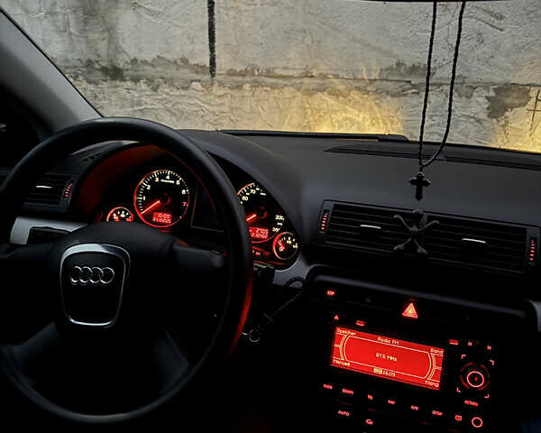 Черный Ауди А4, объемом двигателя 1.6 л и пробегом 210 тыс. км за 7400 $, фото 7 на Automoto.ua