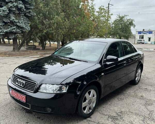 Черный Ауди А4, объемом двигателя 1.6 л и пробегом 198 тыс. км за 6100 $, фото 7 на Automoto.ua