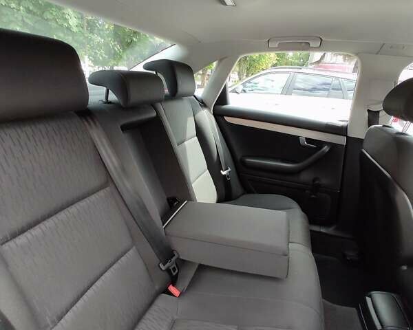 Черный Ауди А4, объемом двигателя 1.6 л и пробегом 245 тыс. км за 7650 $, фото 83 на Automoto.ua