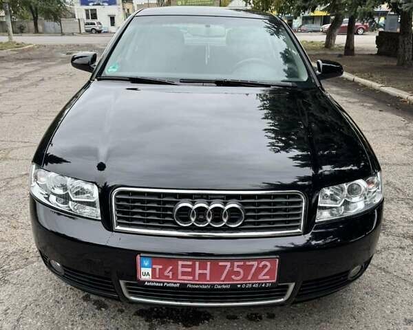 Черный Ауди А4, объемом двигателя 1.6 л и пробегом 198 тыс. км за 6100 $, фото 6 на Automoto.ua