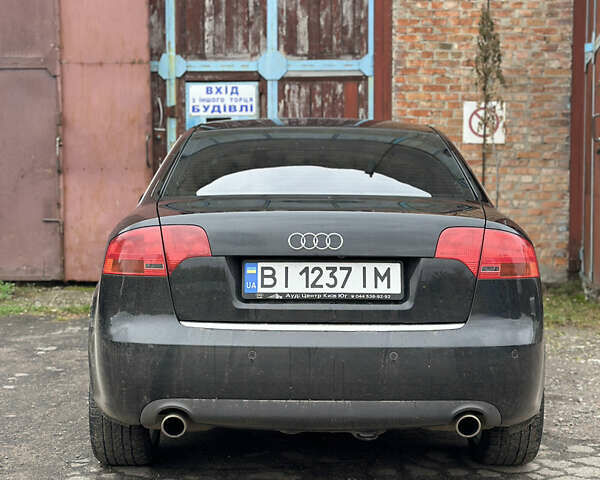 Чорний Ауді А4, об'ємом двигуна 1.78 л та пробігом 295 тис. км за 7299 $, фото 6 на Automoto.ua