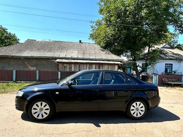 Черный Ауди А4, объемом двигателя 2 л и пробегом 190 тыс. км за 7000 $, фото 5 на Automoto.ua