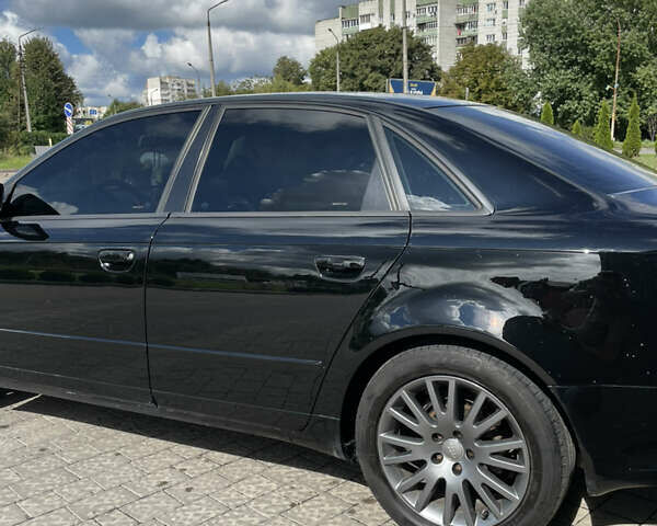 Черный Ауди А4, объемом двигателя 1.6 л и пробегом 357 тыс. км за 6499 $, фото 8 на Automoto.ua