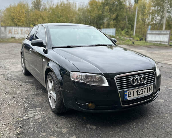 Чорний Ауді А4, об'ємом двигуна 1.78 л та пробігом 295 тис. км за 7299 $, фото 1 на Automoto.ua