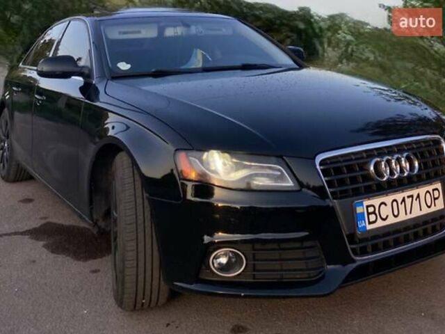 Черный Ауди А4, объемом двигателя 2 л и пробегом 220 тыс. км за 8999 $, фото 1 на Automoto.ua