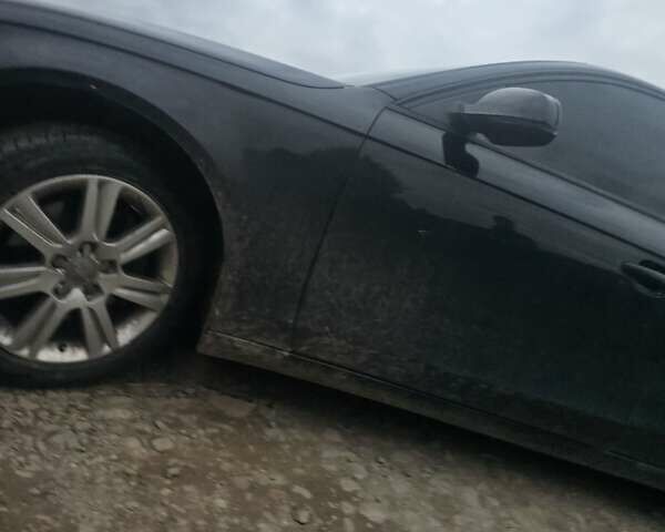 Черный Ауди А4, объемом двигателя 2 л и пробегом 100 тыс. км за 8300 $, фото 3 на Automoto.ua