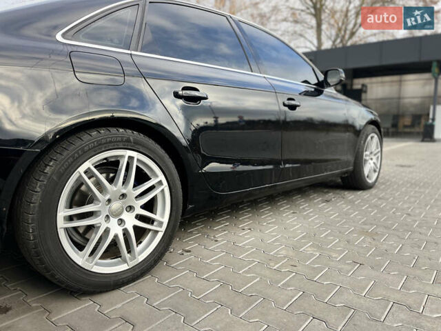 Черный Ауди А4, объемом двигателя 1.98 л и пробегом 285 тыс. км за 8988 $, фото 23 на Automoto.ua