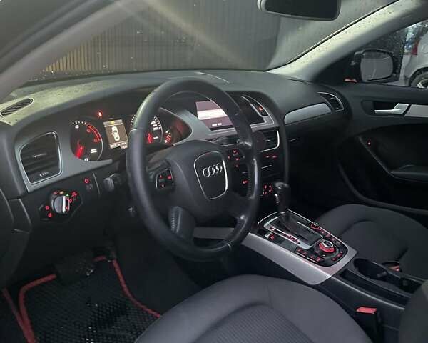 Чорний Ауді А4, об'ємом двигуна 2 л та пробігом 300 тис. км за 8950 $, фото 4 на Automoto.ua