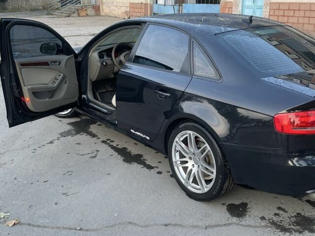 Чорний Ауді А4, об'ємом двигуна 2 л та пробігом 178 тис. км за 10999 $, фото 4 на Automoto.ua