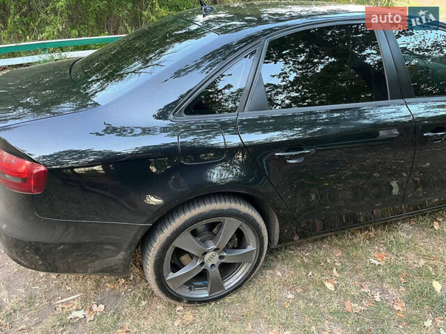 Черный Ауди А4, объемом двигателя 2 л и пробегом 307 тыс. км за 10130 $, фото 6 на Automoto.ua