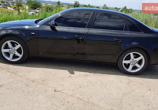Чорний Ауді А4, об'ємом двигуна 1.8 л та пробігом 108 тис. км за 13000 $, фото 4 на Automoto.ua