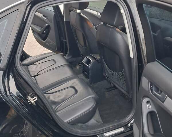 Черный Ауди А4, объемом двигателя 1.98 л и пробегом 196 тыс. км за 11000 $, фото 7 на Automoto.ua