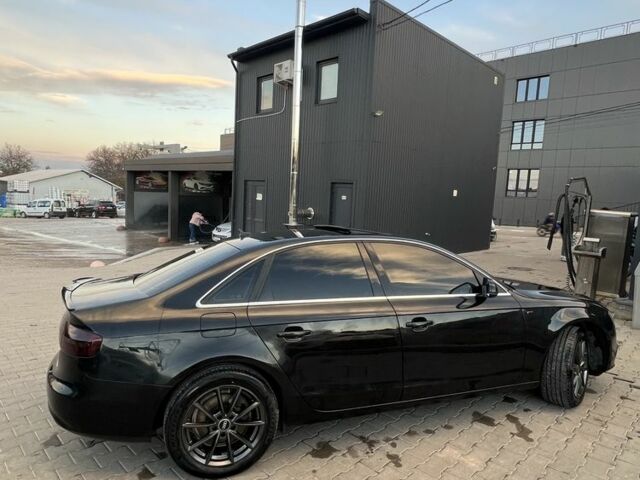 Чорний Ауді А4, об'ємом двигуна 2 л та пробігом 198 тис. км за 10900 $, фото 1 на Automoto.ua