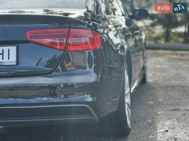 Ауді А4 2013 у Харкові на Automoto.ua Чорний Ауді А4, об'ємом двигуна 1.98 л та пробігом 230 тис. км за 10999 $, фото 8 на Automoto.ua