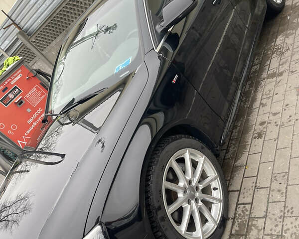 Черный Ауди А4, объемом двигателя 1.98 л и пробегом 183 тыс. км за 14000 $, фото 4 на Automoto.ua