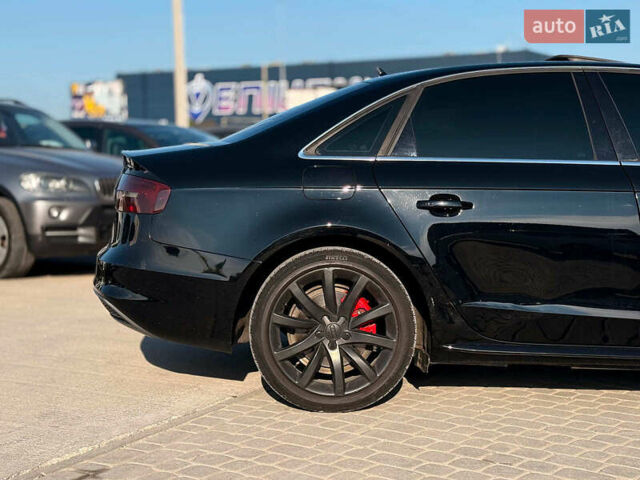 Чорний Ауді А4, об'ємом двигуна 2 л та пробігом 235 тис. км за 11790 $, фото 6 на Automoto.ua