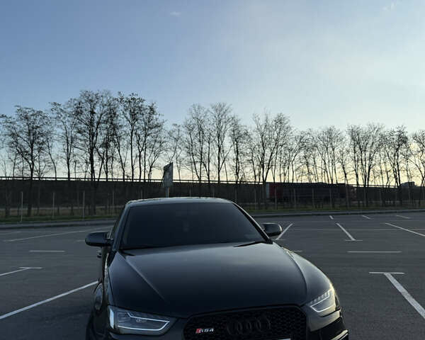 Черный Ауди А4, объемом двигателя 2 л и пробегом 245 тыс. км за 12200 $, фото 1 на Automoto.ua