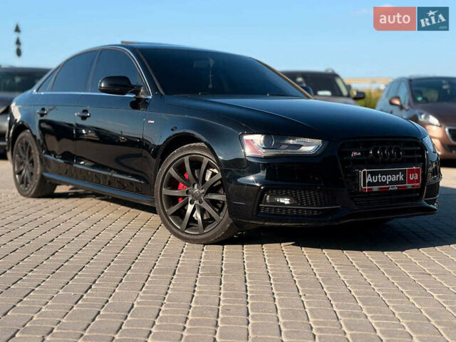 Чорний Ауді А4, об'ємом двигуна 2 л та пробігом 235 тис. км за 11790 $, фото 1 на Automoto.ua