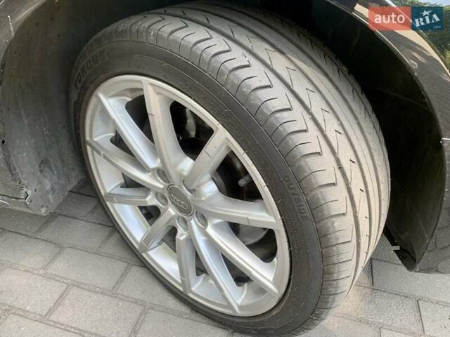 Черный Ауди А4, объемом двигателя 1.98 л и пробегом 144 тыс. км за 12800 $, фото 19 на Automoto.ua