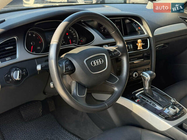 Чорний Ауді А4, об'ємом двигуна 2 л та пробігом 235 тис. км за 11790 $, фото 23 на Automoto.ua