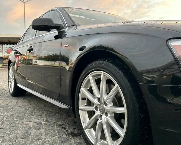 Черный Ауди А4, объемом двигателя 1.98 л и пробегом 227 тыс. км за 14200 $, фото 1 на Automoto.ua